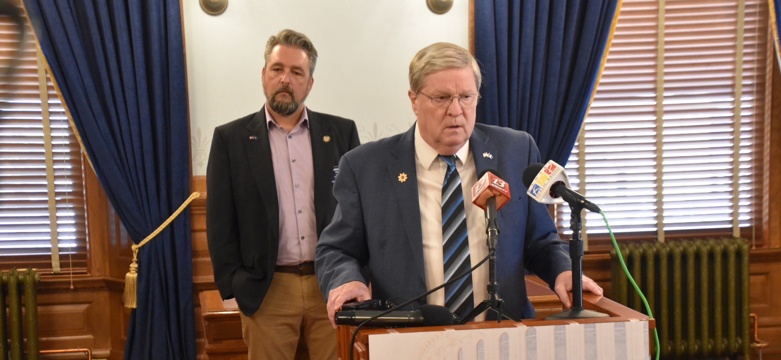 House Minority Leader Vic Miller, right, and Rep. Jason Probst announce their plan to pre-file a bill that would prohibit magistrates from signing search warrants.