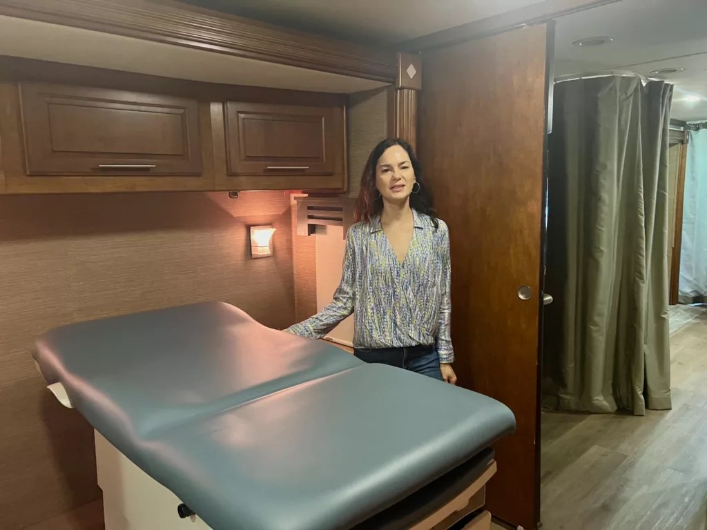 Enid Vasquez of Eastchester Family Services in the exam room of a mobile unit being deployed to help Georgians keep their Medicaid coverage. (Credit: Tammy Joyner) 