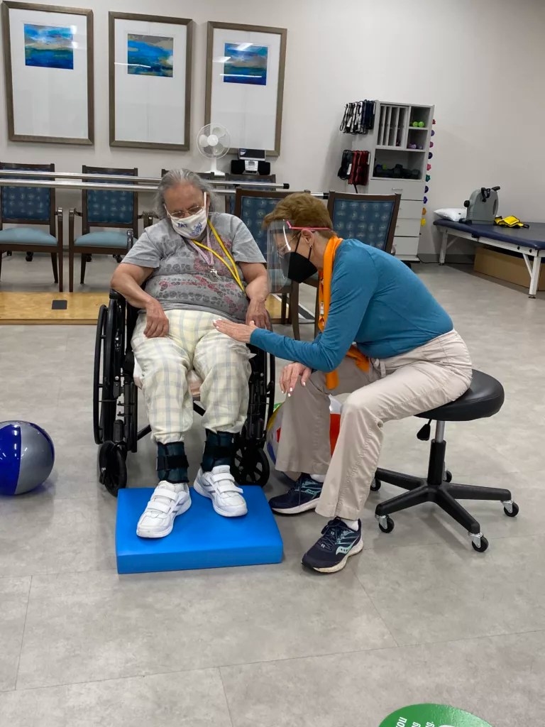 A member of a PACE program receives physical therapy treatment at a PACE senior center in Greensboro, NC.