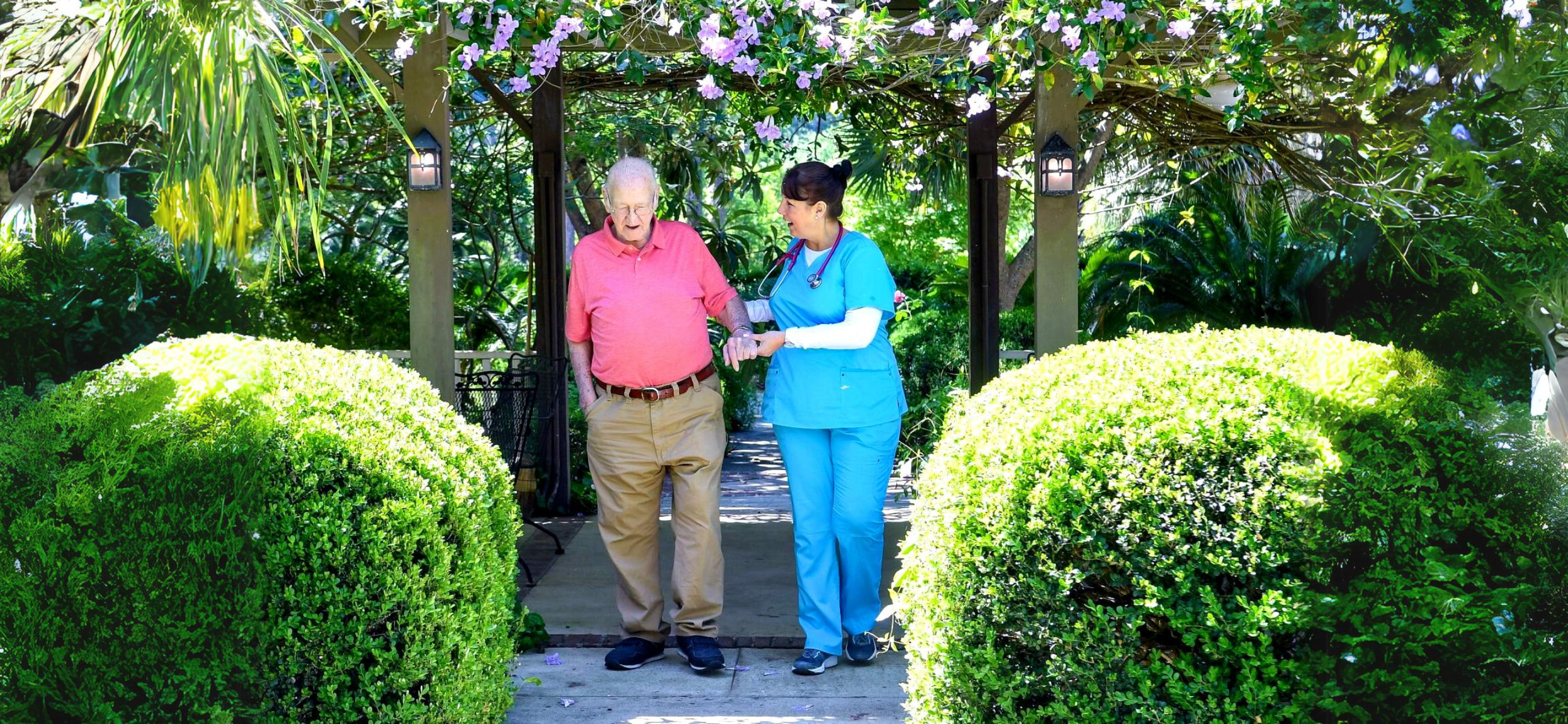A nurse assists a resident at Fellowship Home at Brookside, an assisted living center in Valdosta.