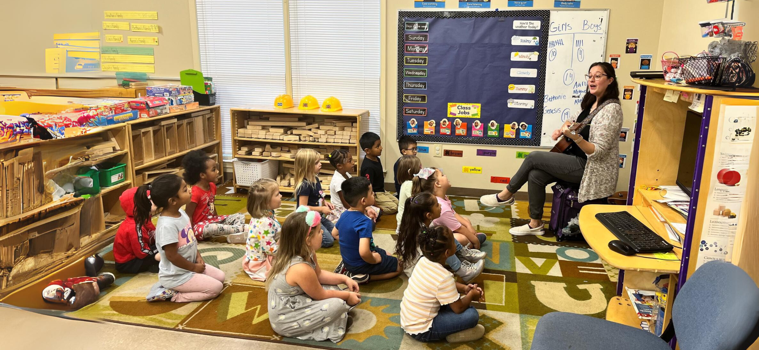 A teacher plays guitar and sings to Pre-K students at a child care center in north Georgia.