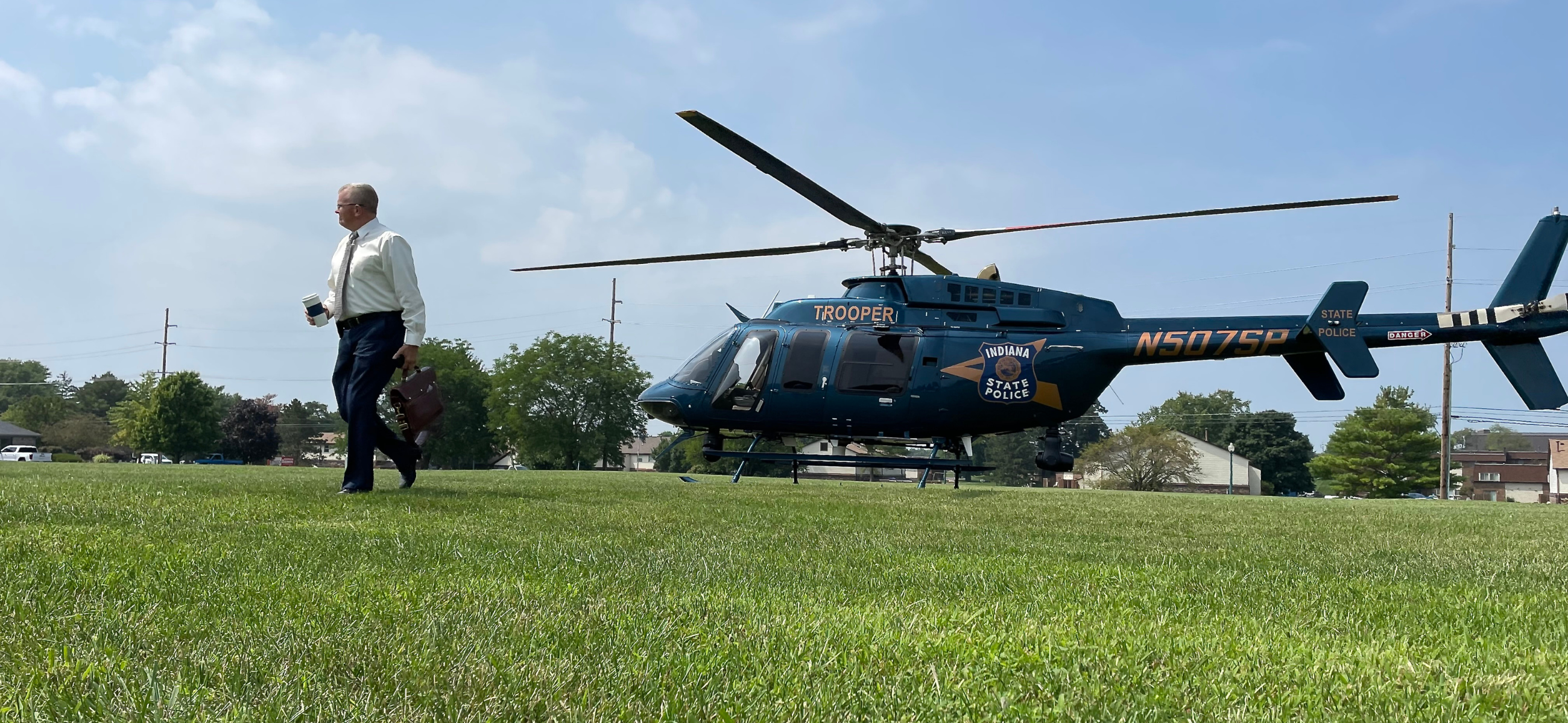 Superintendent Doug Carter exits an Indiana State Police helicopter during a trip to visit the new post in Lowell on Aug. 23, 2023. (Credit: Ryan Martin)