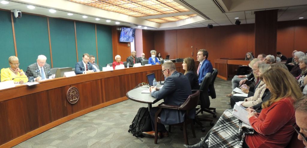 Charlene McGowan, general counsel for the secretary of state's office (center) speaks to members of the Senate Ethics Committee on Nov. 1, 2023. Robert Giles of Dominion Voting Systems (L) and Blake Evans, director of elections for the secretary's office, also testified.