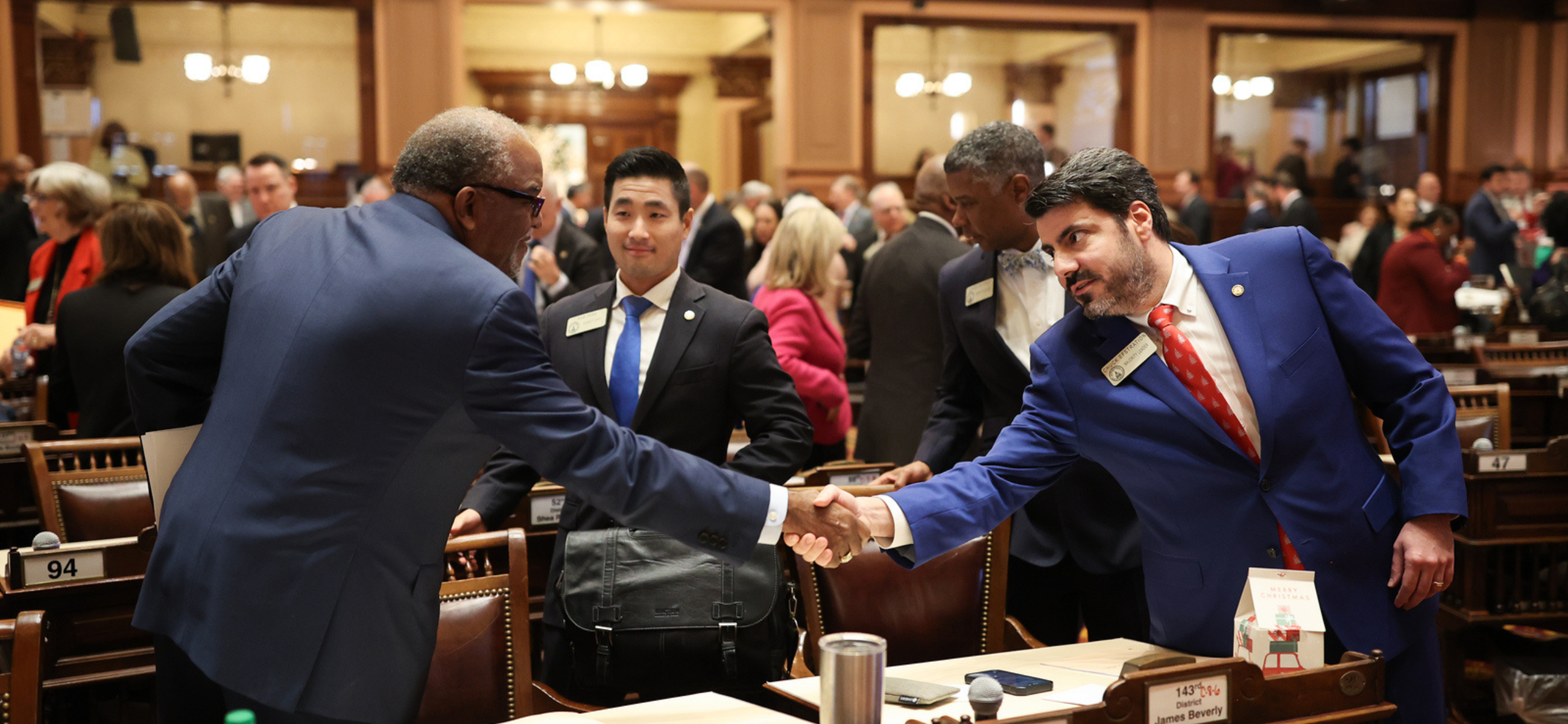 Reps. Al Williams, left, Sam Park and Chuck Efstration on the final day of the 2023 special session. (Credit: Georgia House of Representatives)