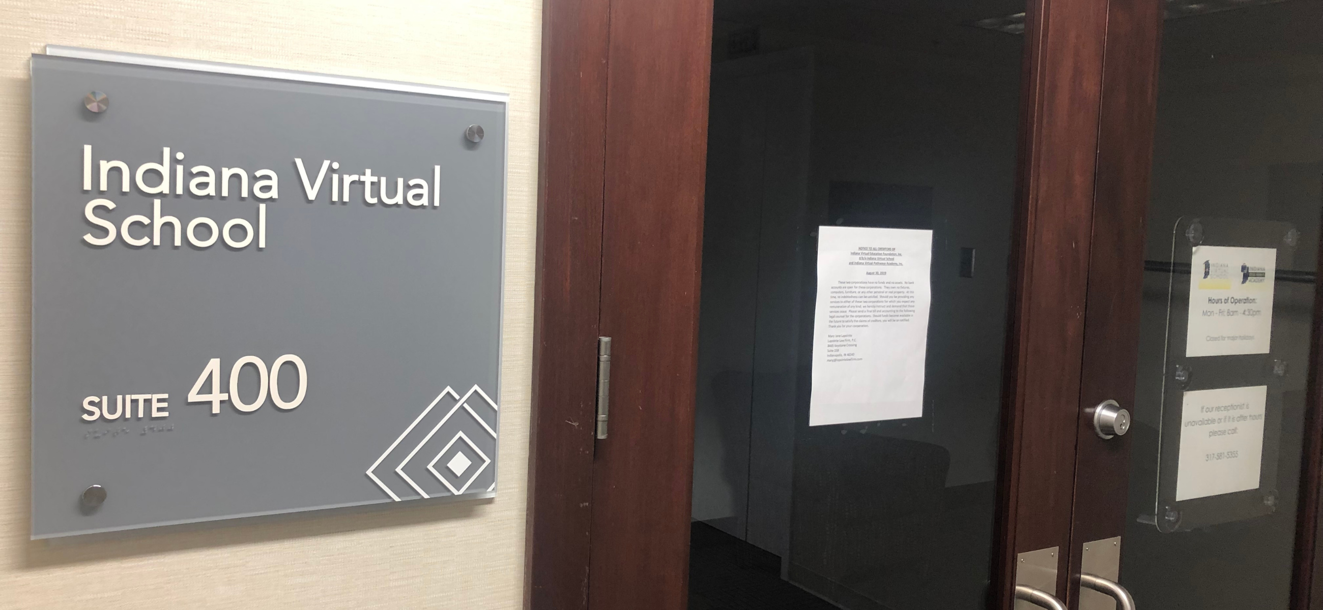 The office door of Indiana Virtual School in Indianapolis after it was ordered closed by state officials in 2019. (Credit: Tom Davies)