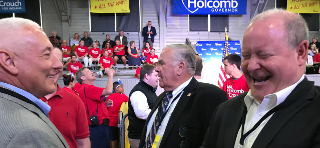Reps. Pence, Baird & Bucshon at the July 2019 reelection kickoff of Gov. Holcomb at the Hoosier Gym in Knightstown. (Credit: Brian Howey)