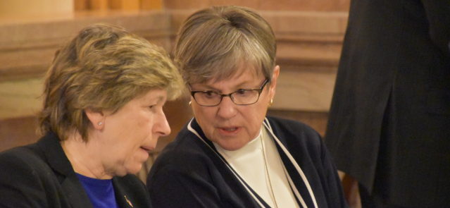 American Federation of Teachers President Randi Weingarten talks with Gov. Laura Kelly before a Jan. 24 labor union rally at the Kansas Statehouse.