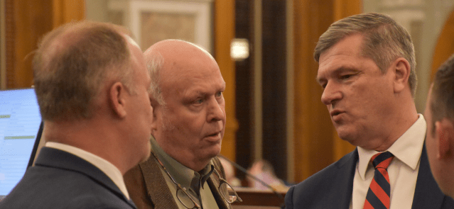 Reps. Adam Smith, Ken Corbet and Chris Croft discuss a tax plan March 26, 2024, on the House floor.