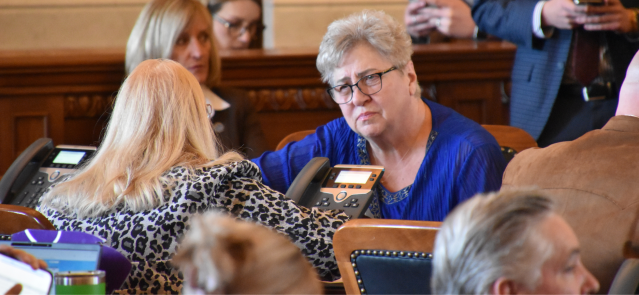 Rep. Brenda Landwehr, right, speaks with Rep. Susan Concannon on March 6, 2024, on the House floor.