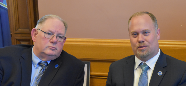 House Speaker Dan Hawkins, left, and Rep. Adam Smith discuss a tax plan March 19, 2024.