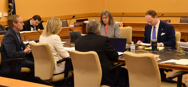 Members of the Kansas House and Senate Judiciary committees meet as a conference committee April 5.