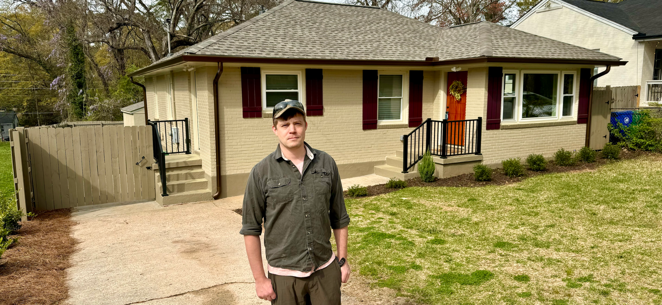 Tim Arko stands in front of the property he formerly owned in south Dekalb County where trespassers stayed for seven months in 2023 while he pursued legal remedies to get them evicted. Arko said he lost about $100,000 in unpaid rent, attorneys fees and diminished resale value of his home, which was damaged by the squatters. It has since been sold, repaired and renovated. (Credit: Jill Jordan Sieder)