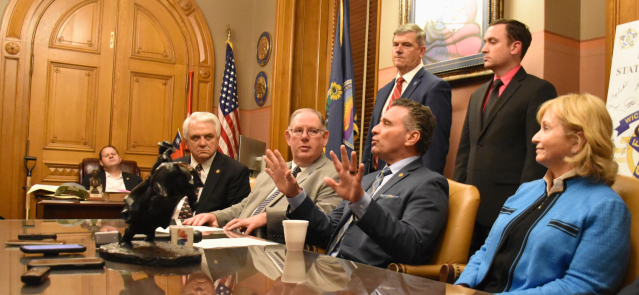 Top Republican lawmakers Larry Alley, Dan Hawkins, Ty Masterson, Caryn Tyson, Chris Croft (back left) and Blake Carpenter (back right) hold a press conference in the early hours of the morning May 1. (Credit: Matt Resnick)