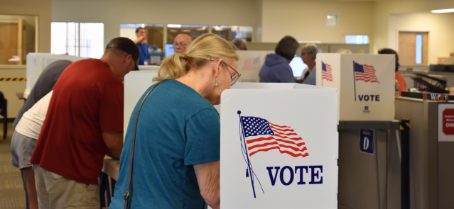 Kansans vote early on Oct. 30 ahead of Election Day at the Shawnee County Election Office.